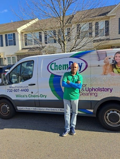 Wilce in front of Van the owner, Wilce, of Wilce's Chem-Dry standing in front of his van